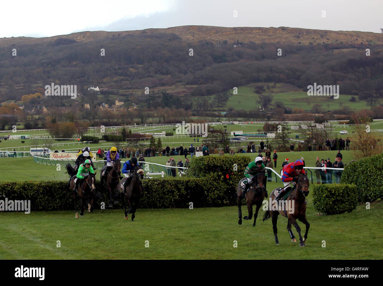 Eventual winner Garde Champetre ridden by JT McNamara runs behind Balthazar King ridden by Richard Johnson (right) in the Glenfarclas Cross Country Handicap Chase during day one of The International at Cheltenham Racecourse. Stock Photo