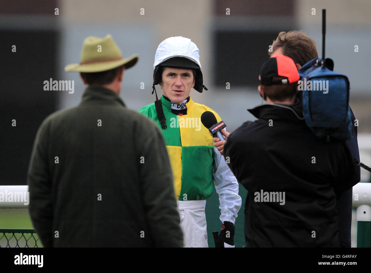 Jockey Tony McCoy is interviewed by At The Races television crew Stock Photo