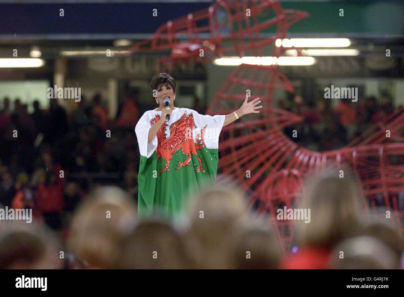 Welsh singer Shirley Bassey performs during the opening of the Millennium Stadium in Cardiff, ahead of Wales's World Cup rugby match against Argentina. Stock Photo