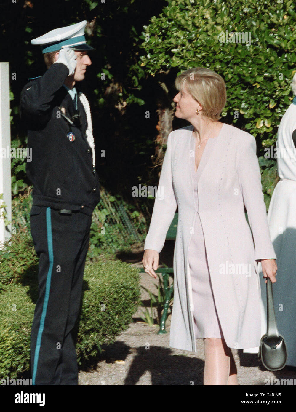 Sophie, Countess of Wessex, admires a gendarme as she leaves St Bartholomews Church in Dinard, France, during the royal visit to the British Film Festival. Stock Photo