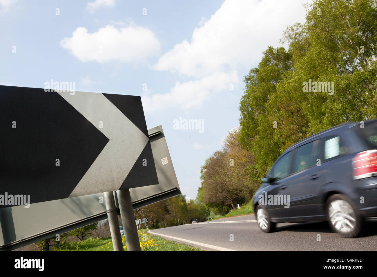 Road warning sign 'Sharp deviation of route', Petersfield, Hampshire, England, United Kingdom, Europe Stock Photo