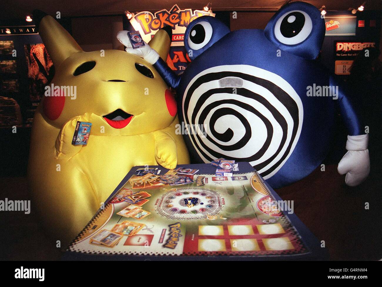 Characters from the Pokemon Trading Card Game, Paly, play the game during  Toy 99, in London. 24/04/00: The demand for Pokemon merchandise has turned  it into a multi-million pound industry and is