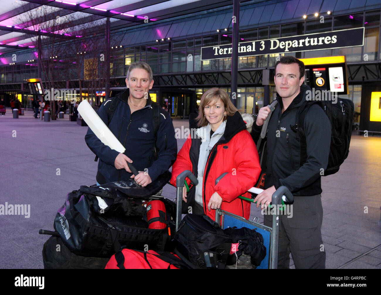 RETRANSMISSION, correcting destination to South Pole. (left - right) Explorers Neil Laughton, Julie Ashmore and James Balfour before they depart from Terminal 3 of Heathrow Airport to the South Pole on an expedition to mark the anniversary of Captain Robert Scott's death. Stock Photo