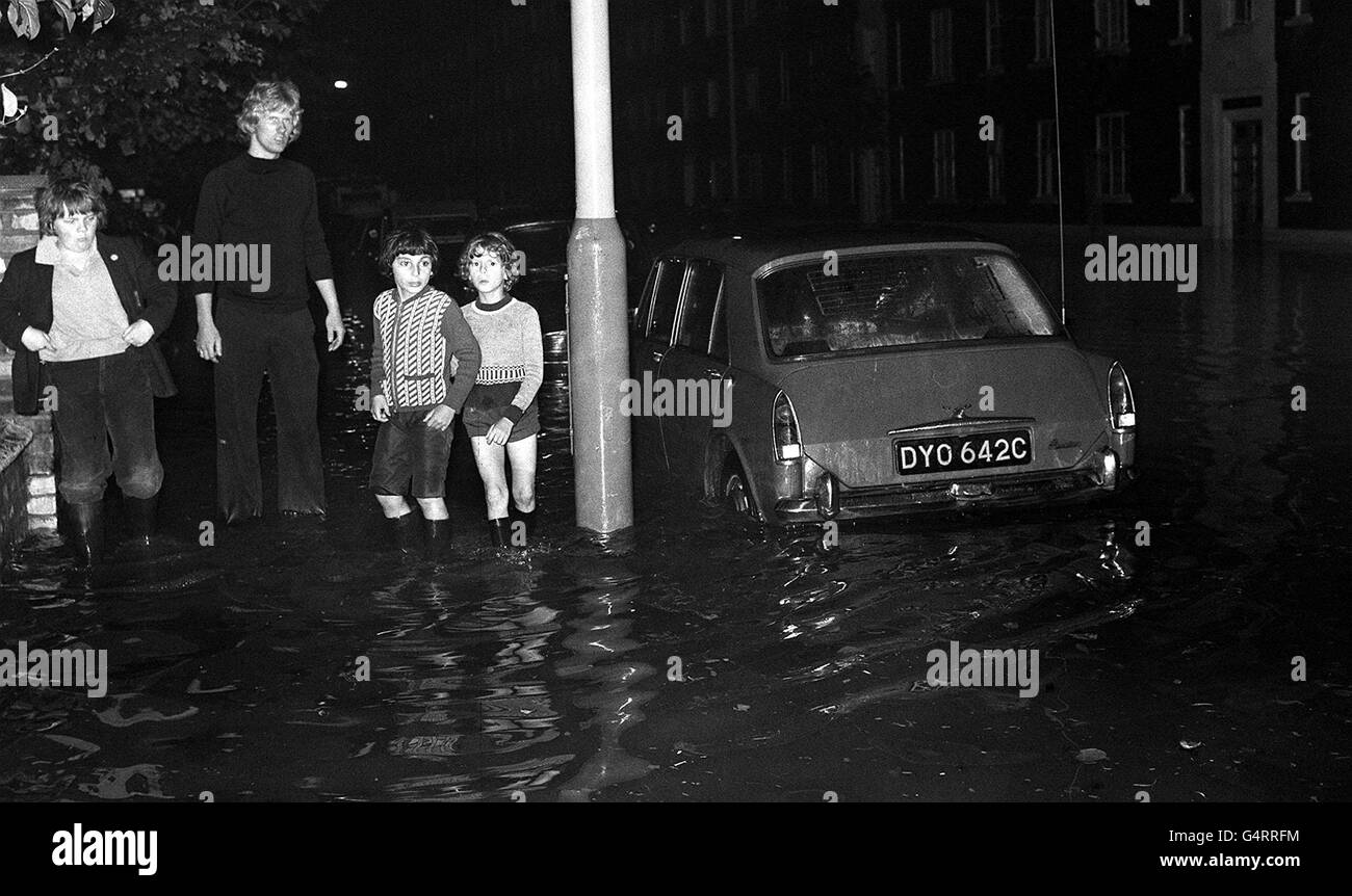 The scene in Belsize Road, North London, after a violent storm flooded the area. Many London Underground services were cancelled after rain flooded tunnels, causing signals to turn to 'danger'. Stock Photo
