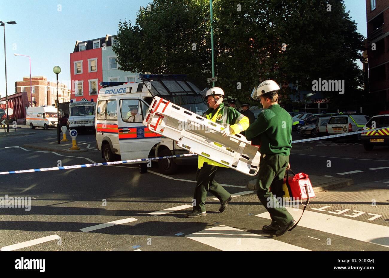 Ambulance Crews Hurry To The Crash Scene After Two Mainline Trains ambulance-crews-hurry-to-the-crash-scene-after-two-mainline-trains