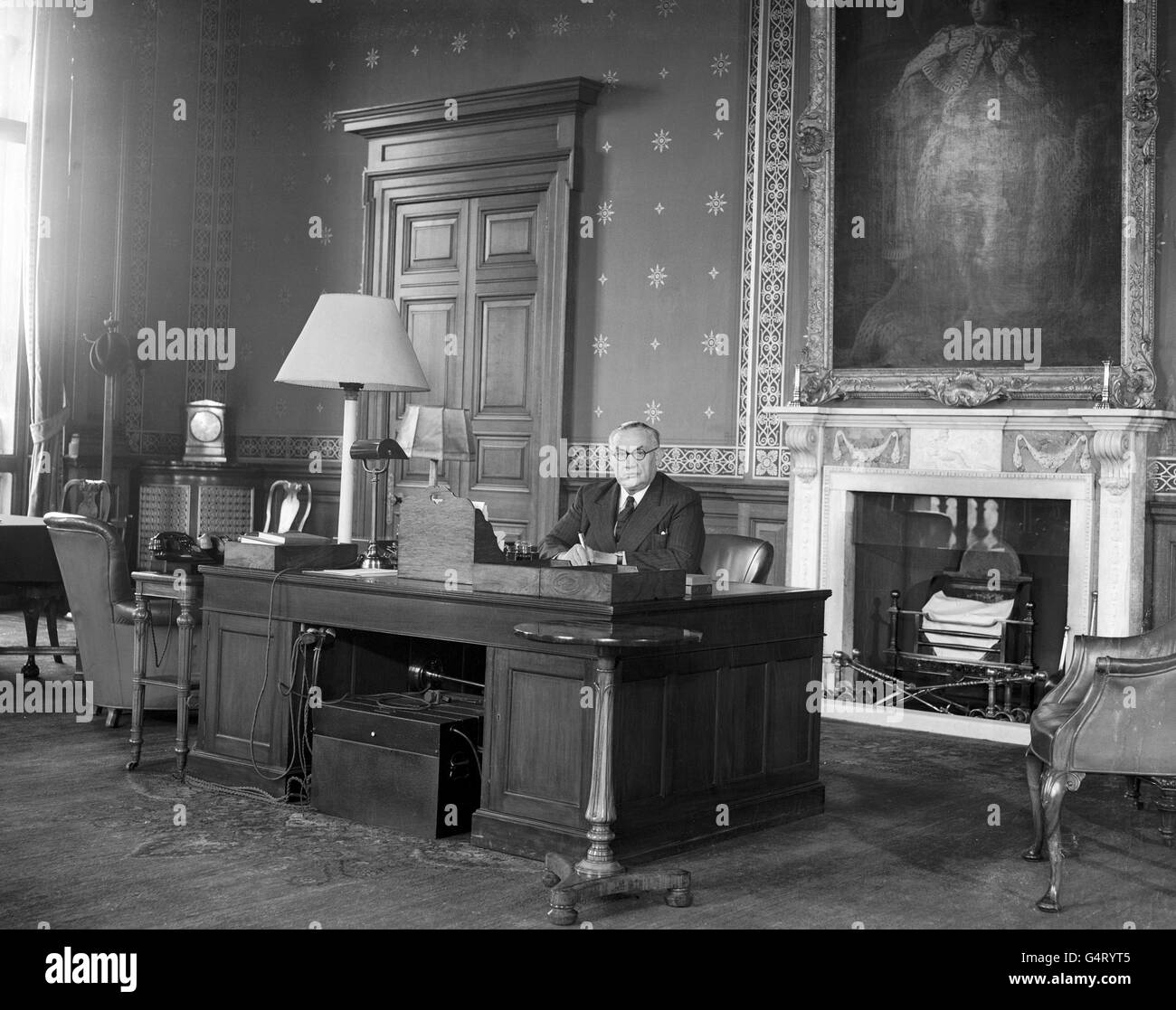 Labour politician Ernest Bevin, Secretary of State for Foreign Affairs, at his desk in the foreign office Stock Photo