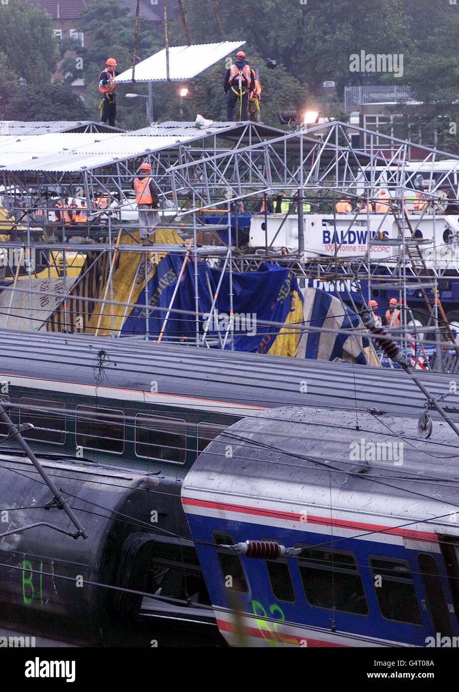 A scaffold canopy is erected around carriage H at the scene of the Paddington Rail Crash. Stock Photo