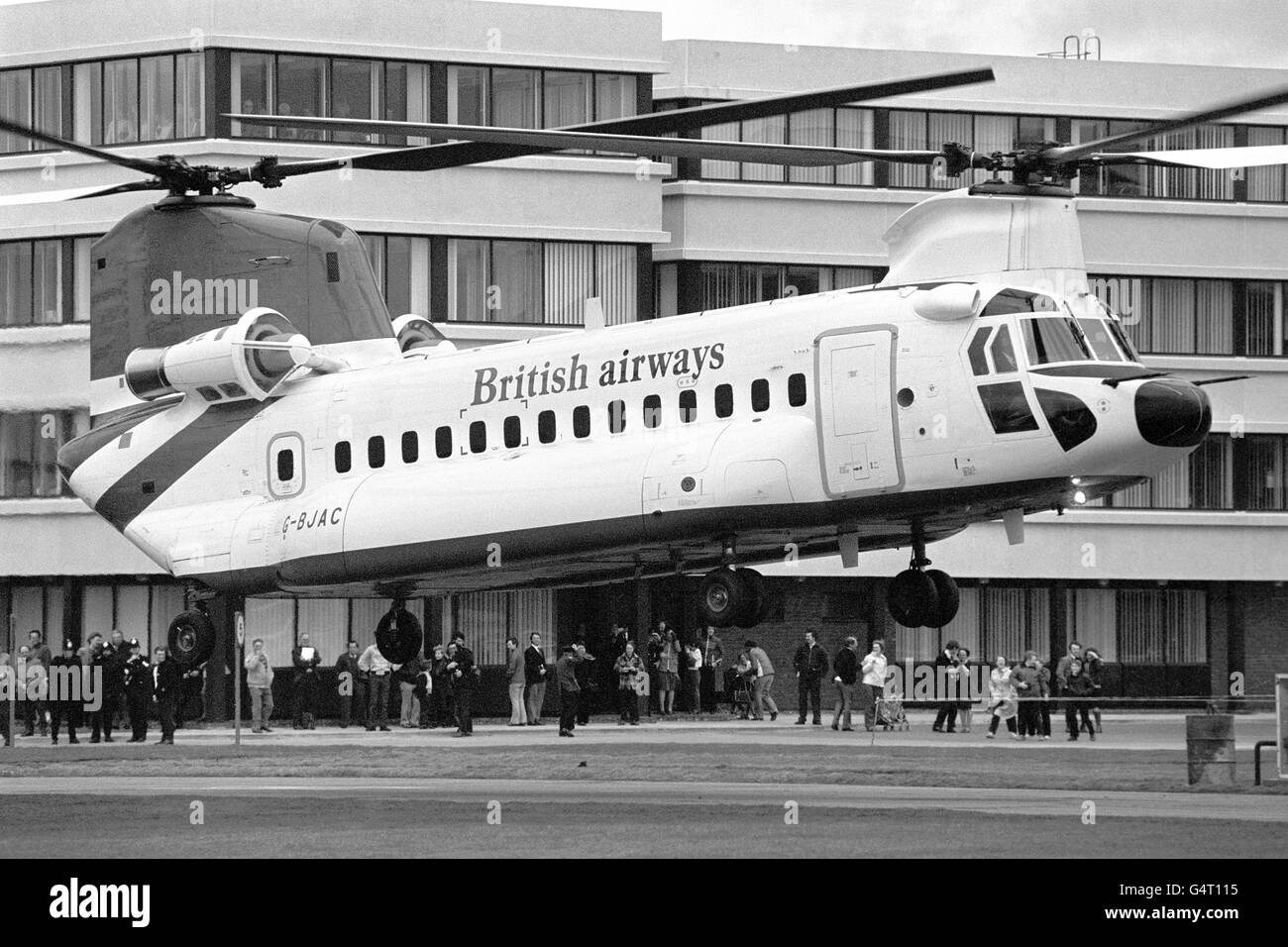 British Airways first commercial helicopter lands at London's Gatwick Airport. The Boeing Vertol 234 has been described as the first real helicopter airliner, holding 44 passengers with full airline trim, four-abreast centre-aisle seating, hot meals and a lavatory. The twin-rotor aircraft is primarily for the operation between Aberdeen and the more distant North Sea oil platforms Stock Photo