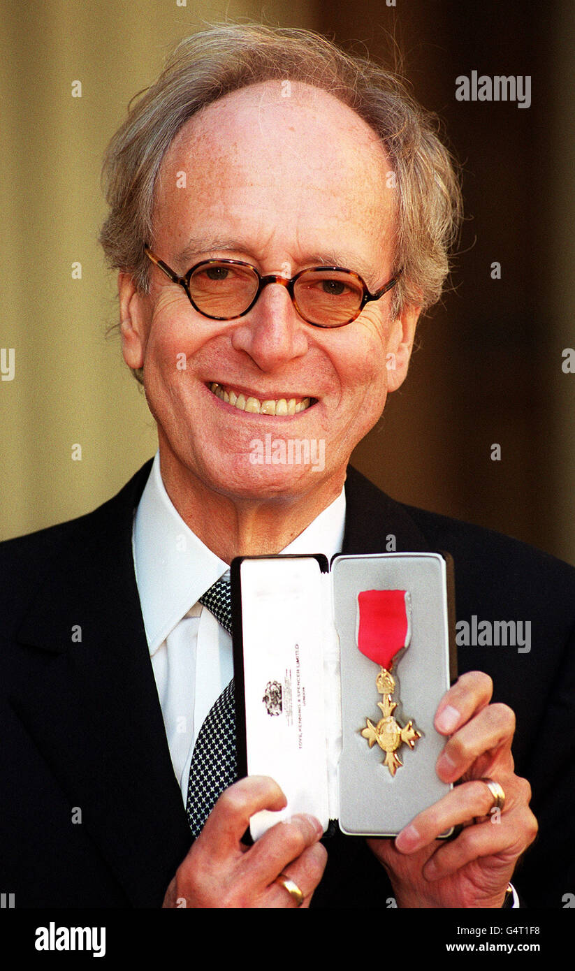 Film score composer John Barry with his CBE, which he received from HM Queen Elizabeth II at Buckingham Palace. Stock Photo