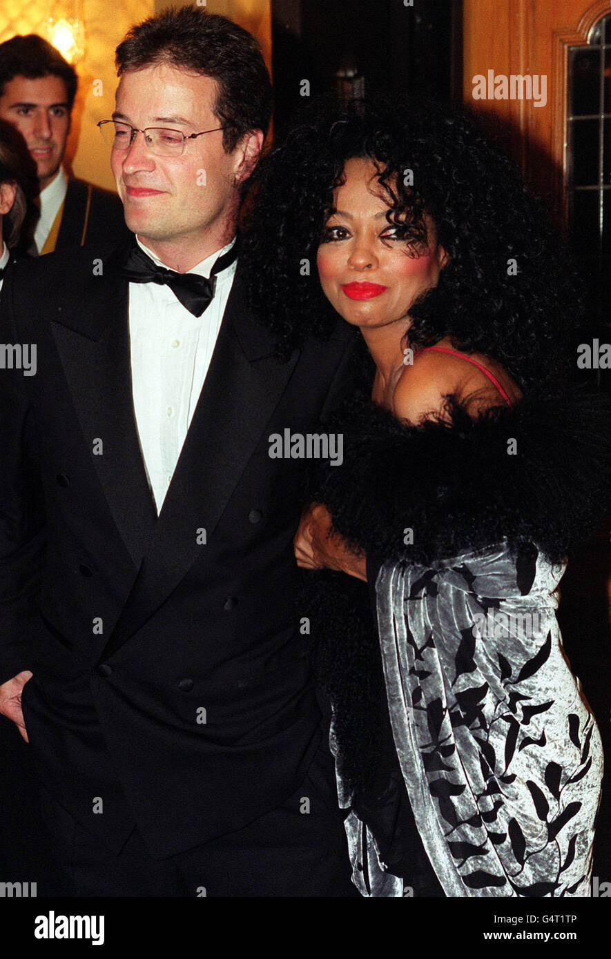 American singer Diana Ross accompanied by her friend Tim Willis at the Cafe Royal in London for the BIFA (British Independent Film Awards). Stock Photo