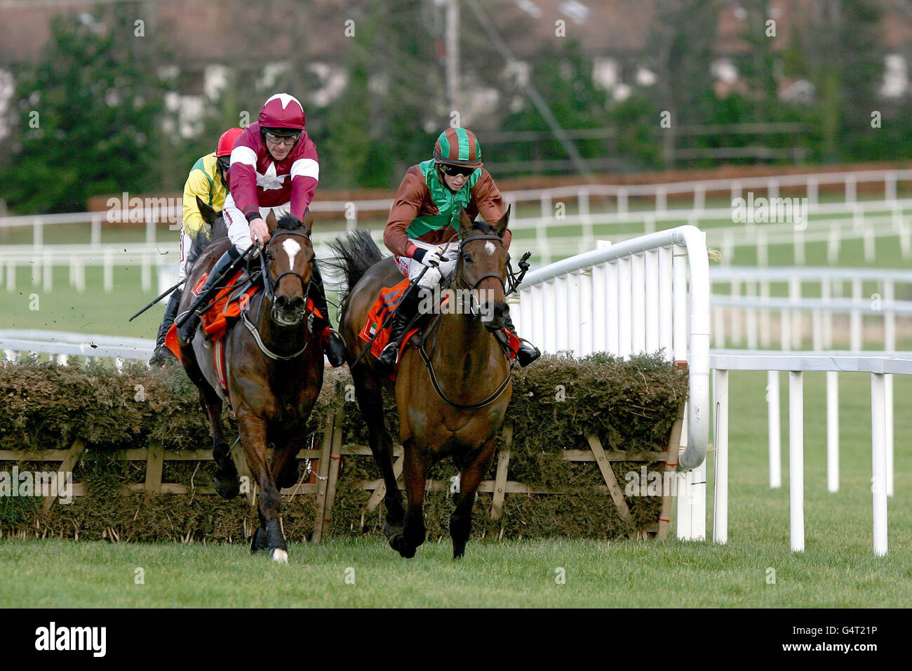 Midnight Game (left) ridden by Davy Russell goes on to win The United Arab Emirates Embassy Maiden Hurdle ahead of Joxer, ridden by Bryan Cooper during the Christmas Festival at Leopardstown Racecourse, Dublin, Ireland. Stock Photo