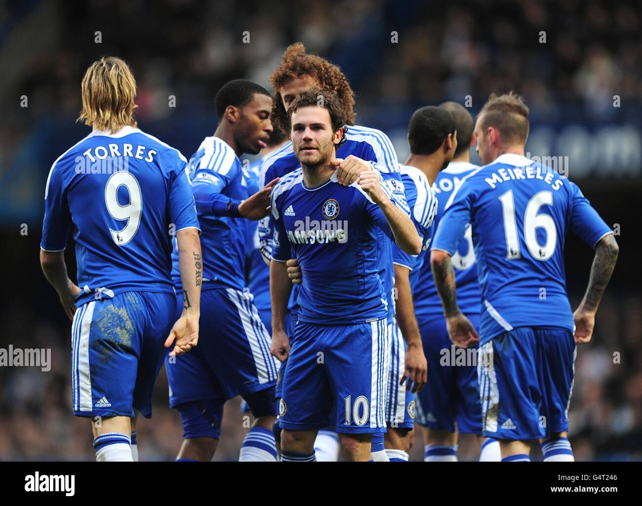 Chelsea's Juan Mata (centre) celebrates after scoring the first goal of the game Stock Photo