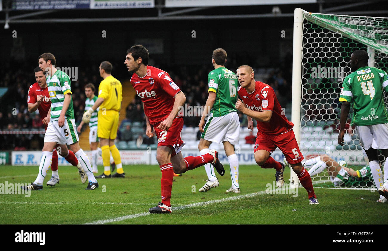 Charlton's Danny Holland (centre) celebrates scoring during the npower Football League One match at Huish Park, Yeovil. Stock Photo