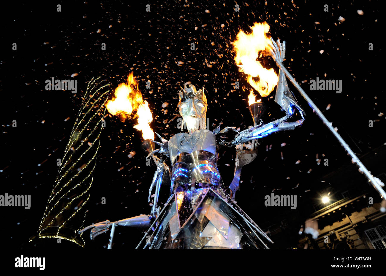 Performers take part in a parade through Northumberland Street, Newcastle, to celebrate the start of the new year. Stock Photo