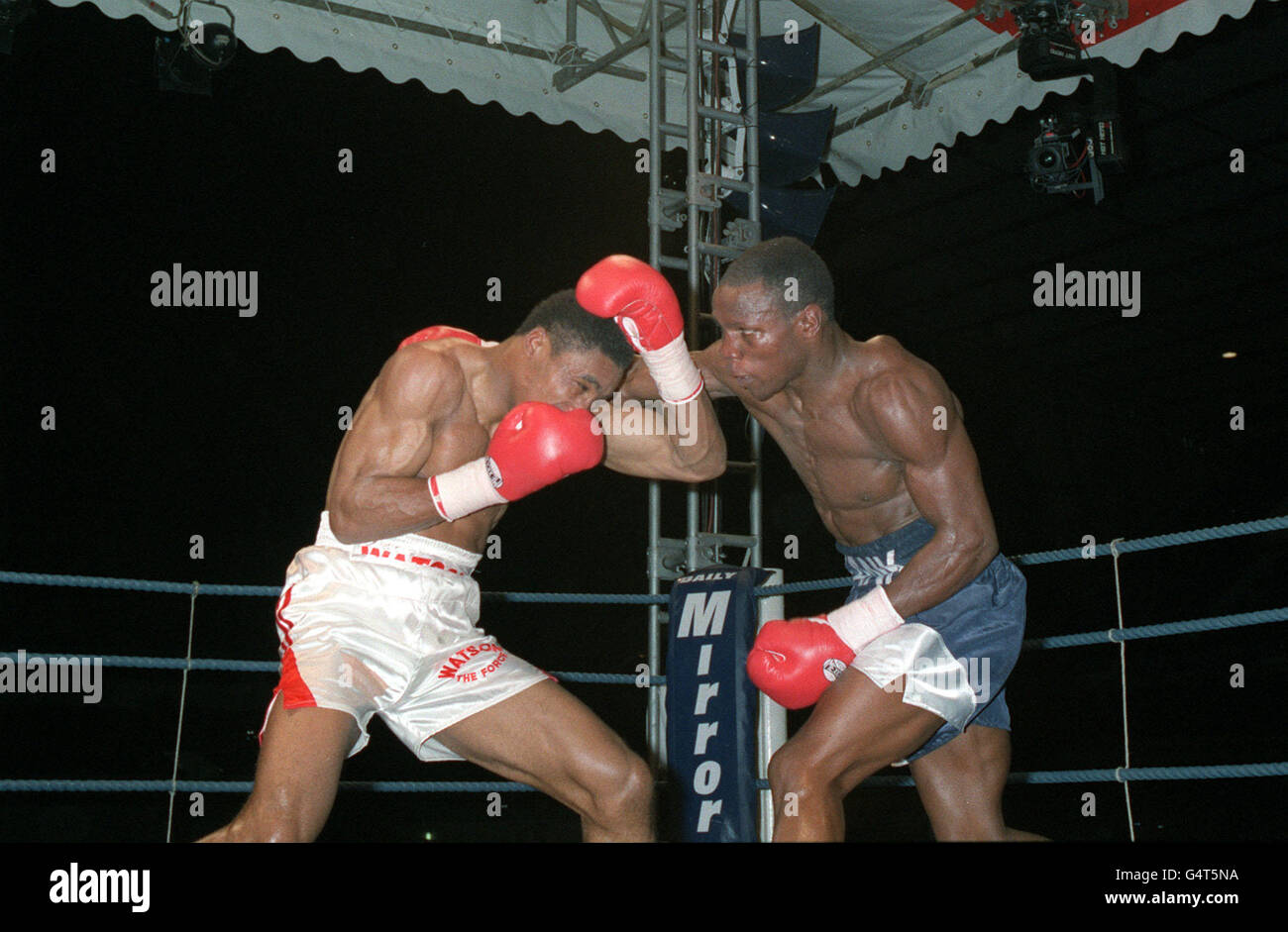 boxing vacant wbo super middleweight title fight chris eubank v michael watson white hart lane london chris eubank lands a punch to michael watson s head during their wbo title