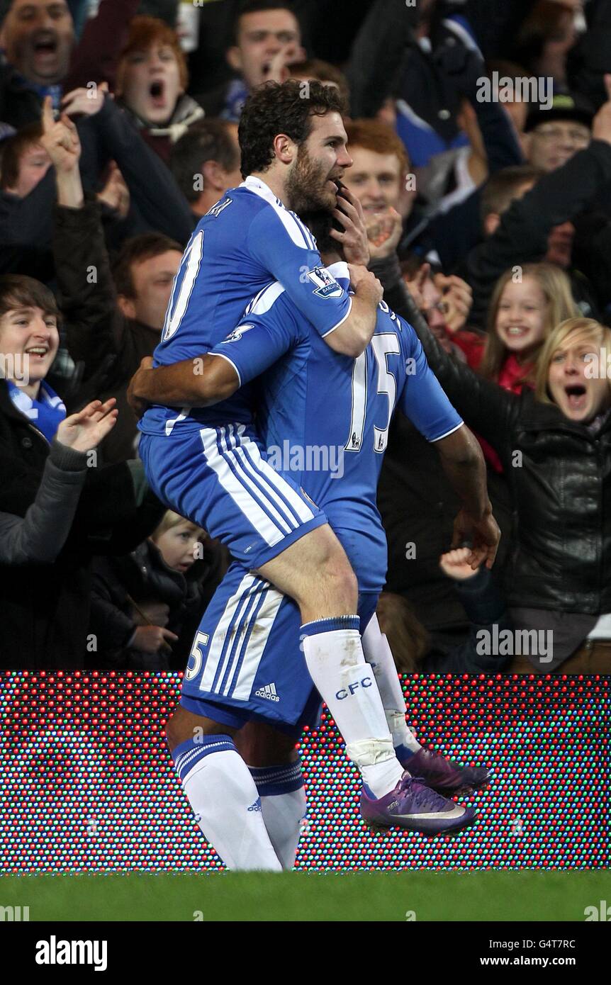 Soccer - FA Cup - Third Round - Chelsea v Portsmouth - Stamford Bridge. Chelsea's Juan Mata (left) celebrates with his team-mate Florent Malouda after scoring his team's opening goal Stock Photo