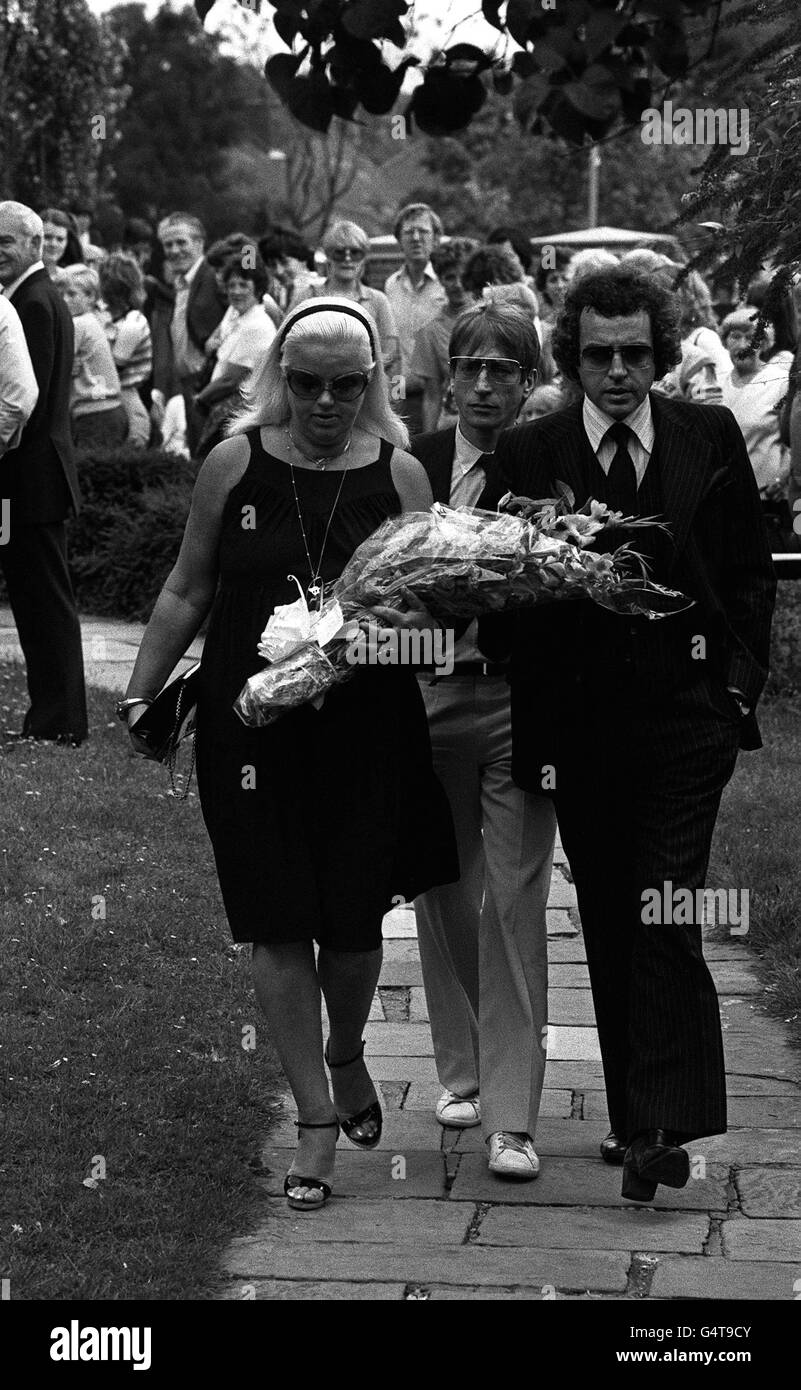 Actress Diana Dors arriving with husband Alan Lake (right) and actor Andrew Ray (centre) at Chingford Old Church today for the funeral service of Mrs Violet Kray, mother of the Kray twins, two of London's most notorious gangsters. The twins, Ronnie & Reggie, were brought from prisons where they are serving life sentences for murder for the funeral. Stock Photo