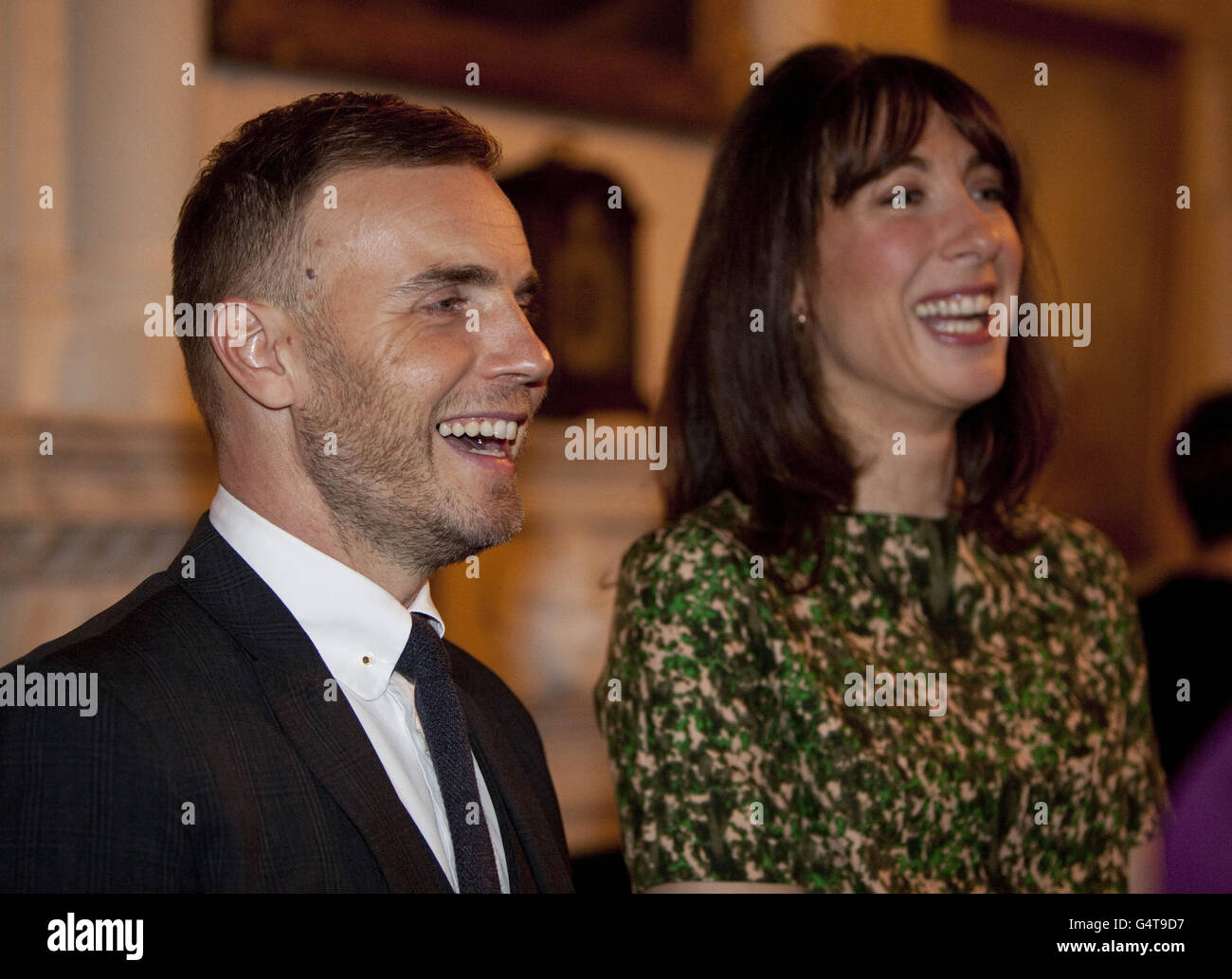 Prime Minister's wife Samantha Cameron stands with singer Gary Barlow during a reception at 10 Downing street for supporters and beneficiaries of the BBC's Children in Need charity. Stock Photo