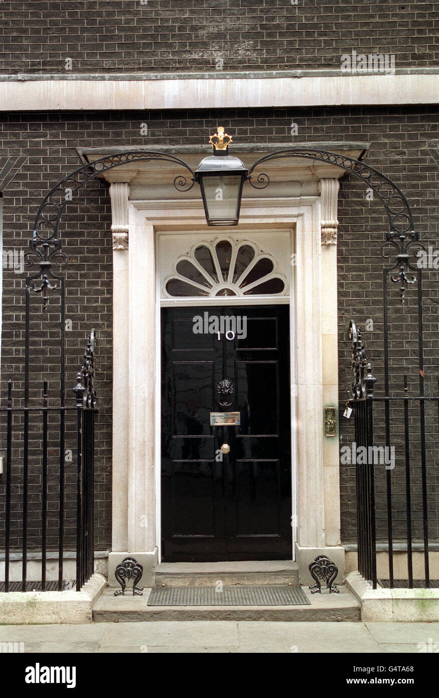 The door of 10 Downing Street, Whitehall, London, offical residence of the British Prime Minister. Stock Photo