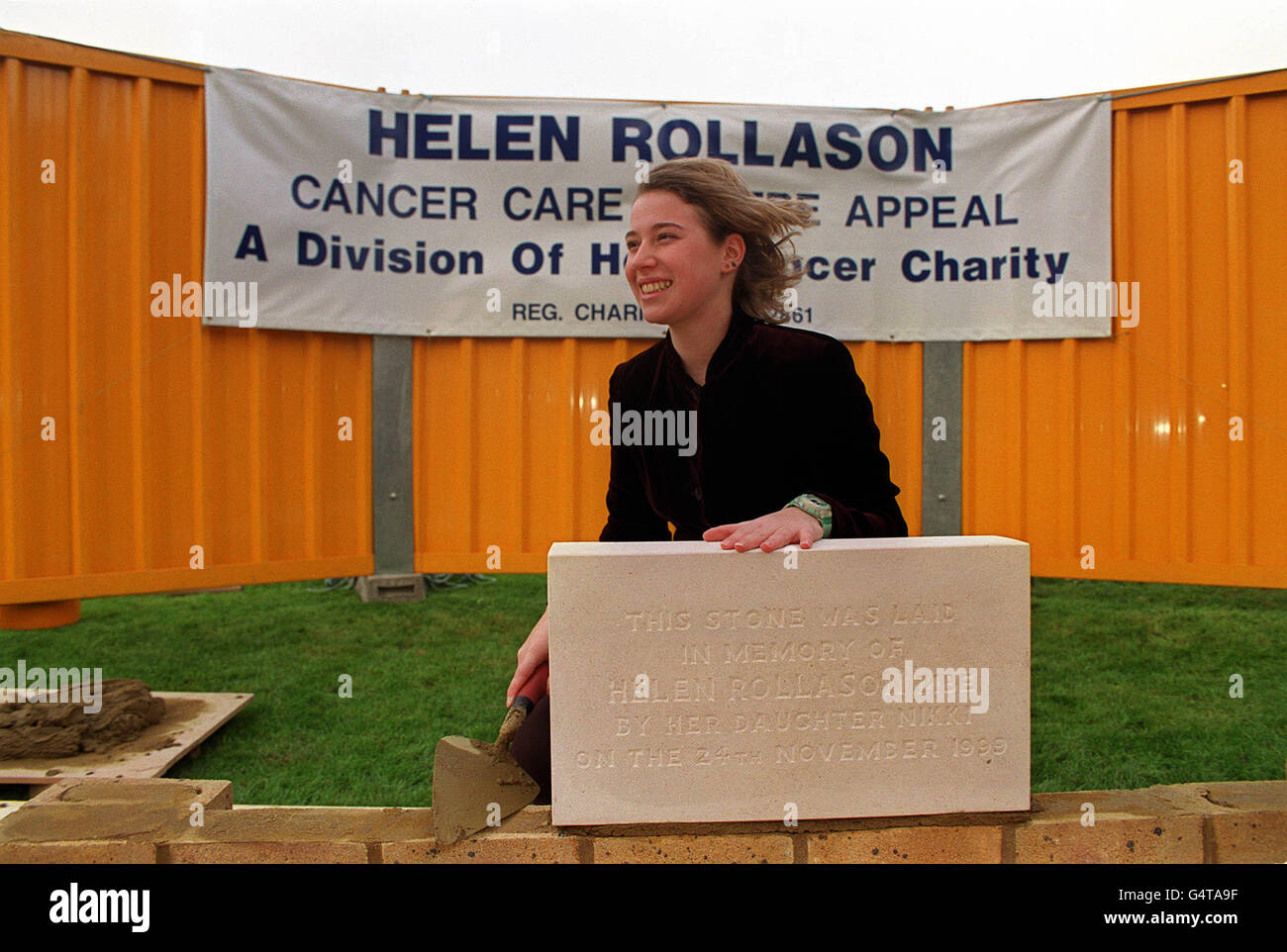 Nikki Rollason,16, lays a foundation stone for a cancer centre, at the North Middlesex Hospital in north London, to be named after her mother, BBC presenter Helen Rollason. * Helen, 43, of Shenfield, near Brentwood, Essex, died of cancer in August, two years after being given just three months to live. She set up the appeal for the cancer centre at the North Middlesex Hospital, but did not live to see the start of building work. Stock Photo