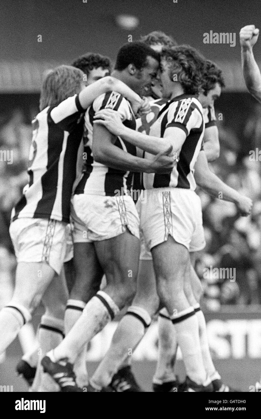 Soccer - FA Cup - Quarter Final - West Bromwich Albion v Nottingham Forest - The Hawthorns. West Bromwich Albion's Cyrille Regis (centre) is congratulated by team-mates after scoring his teams second goal Stock Photo