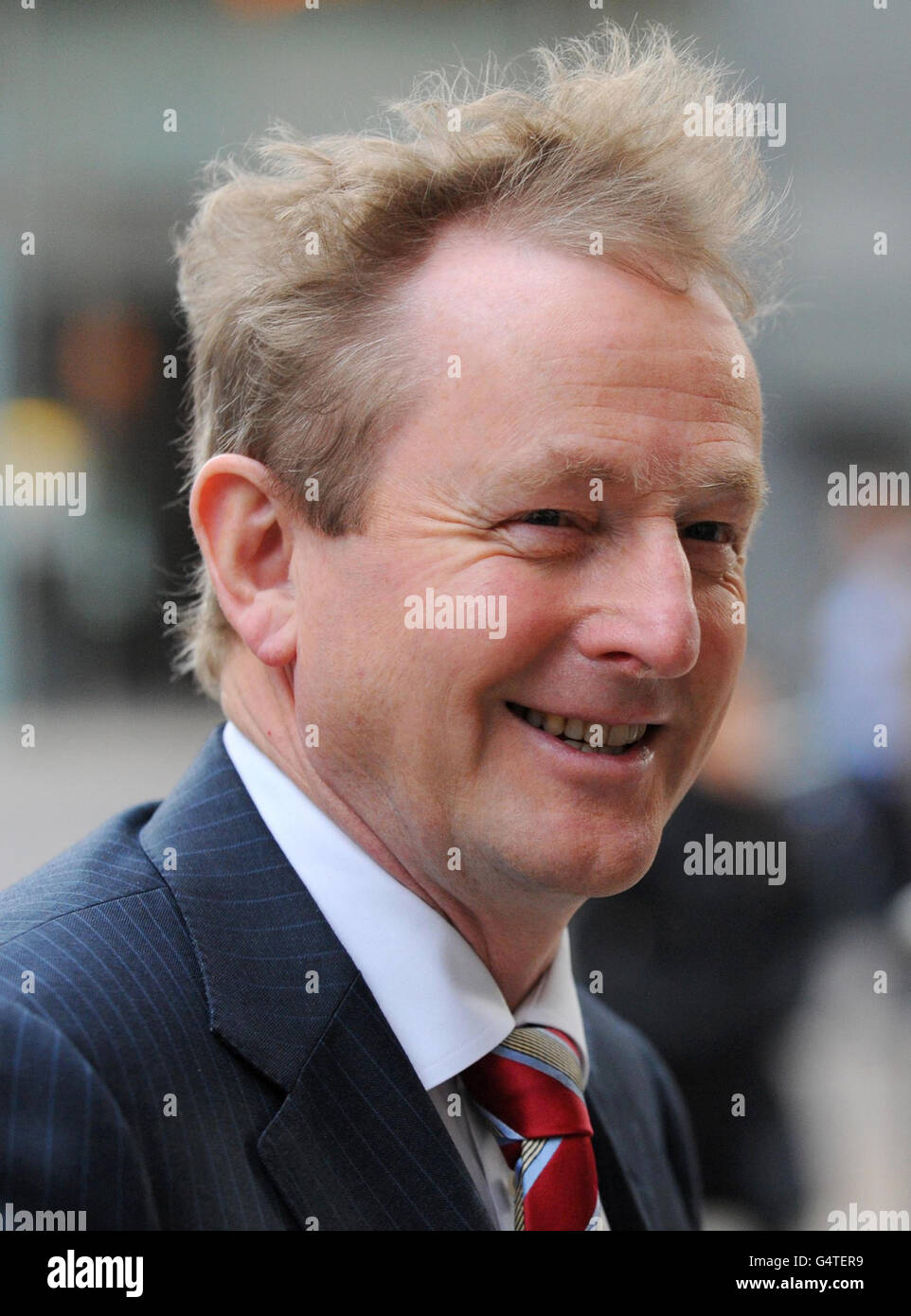 Irish Taoiseach Enda Kenny arrives at Thomson Reuters, in Canary Wharf, London where he is due to give a speech at the start of his visit to the UK. Stock Photo