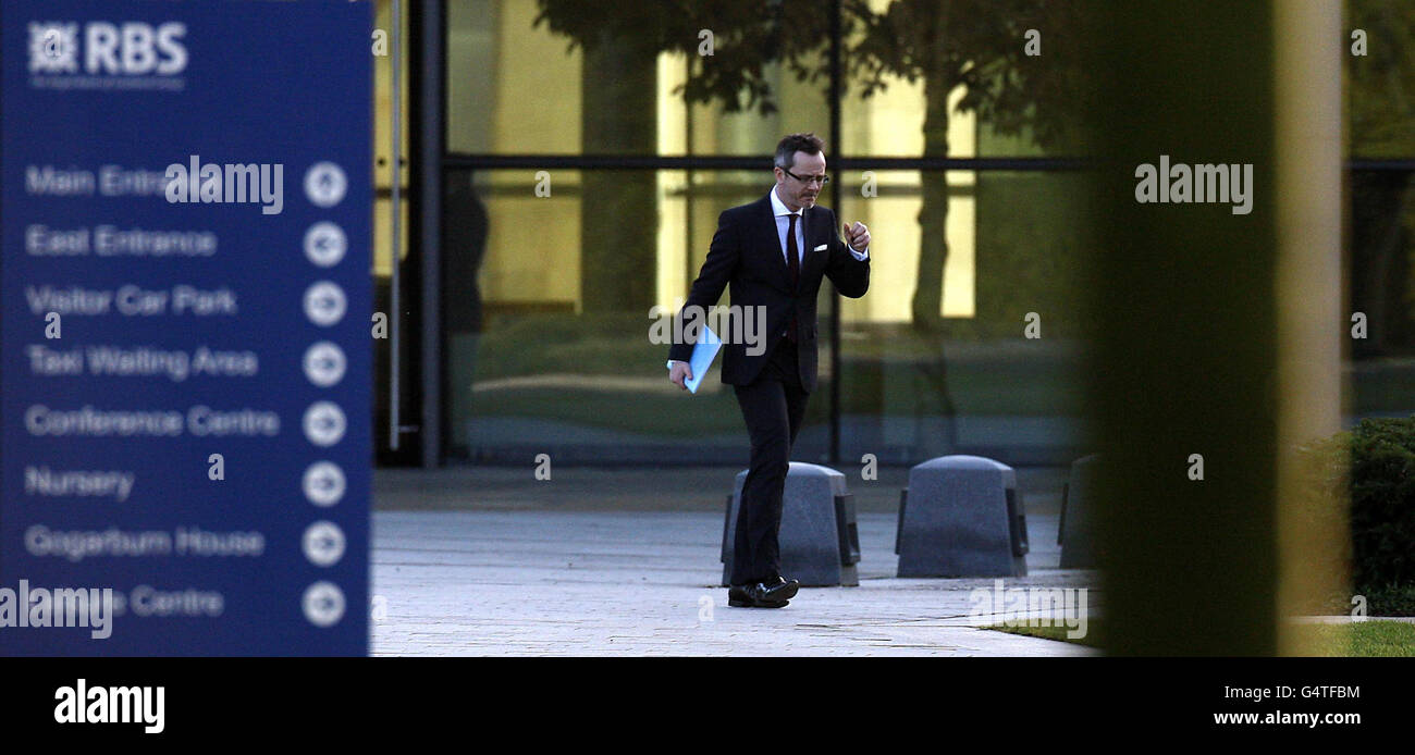 RBS job cuts. A man walks past the Royal Bank of Scotland headquarters at Gogarburn in Scotland. Stock Photo