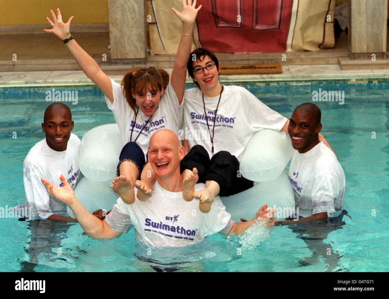 Comedy duo / television presenters Mel (left) and Sue, and former Olympic gold medallist Duncan Goodhew (centre) and British Olympic hopefuls Mark Richardson (right) and Marlon Devonish, at the launch of BT Swimathon 2000, at Berkley Health Club and Spa, London. Stock Photo