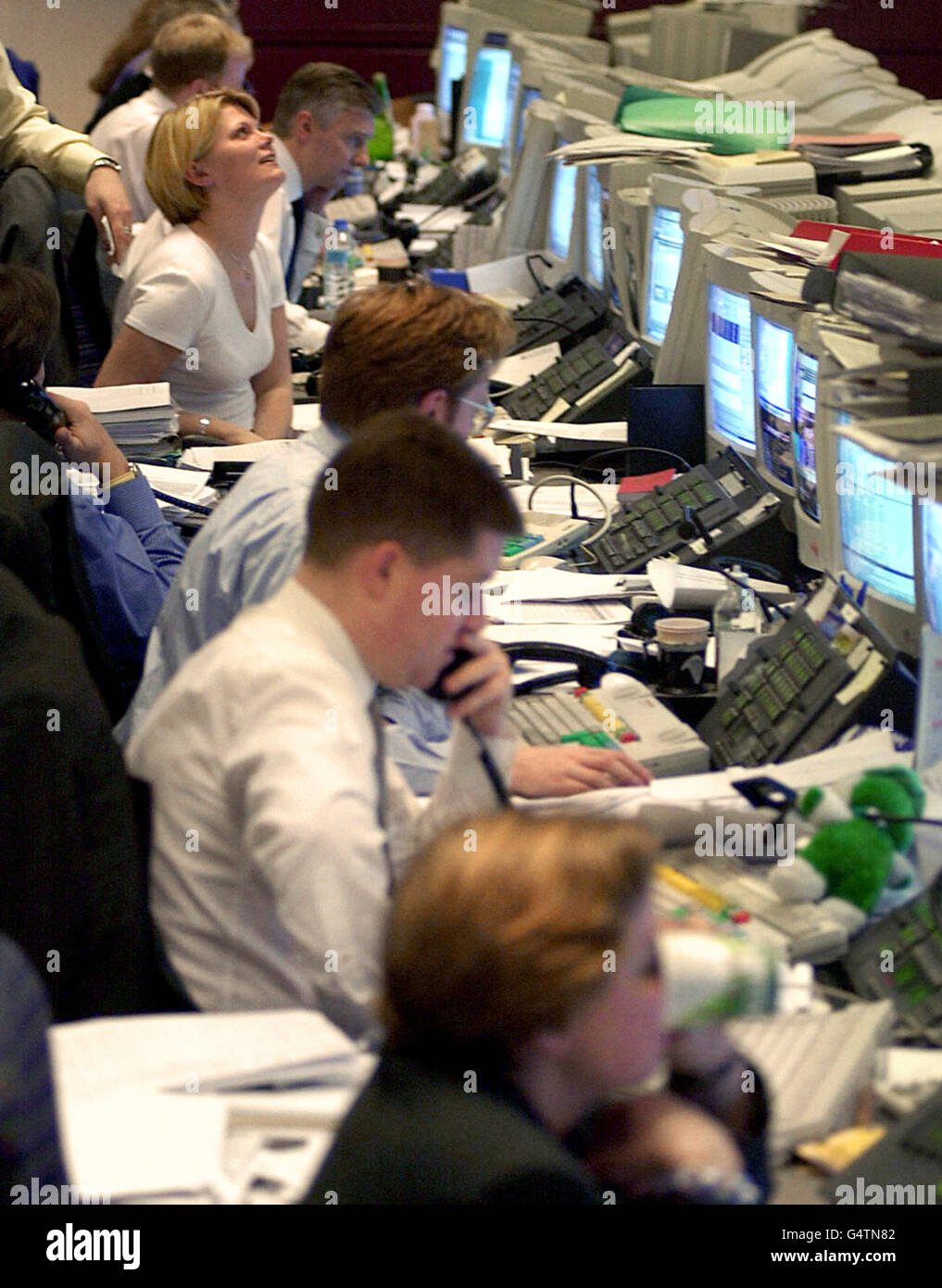 Dealers at work in the dealing room at the Royal Bank of Scotland in Holborn. The Millennium, or Y2K, bug has failed to make the impact upon computer systems which was predicted. Stock Photo