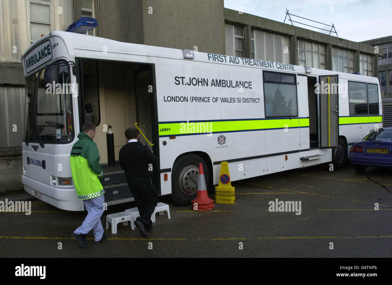 An ambulance bus parked outside the Accident and Emergency entrance to Nortwick Park Hospital