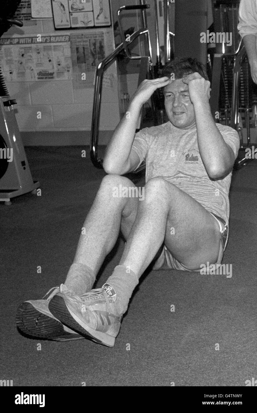 Conservative MP for Bournemouth East, David Atkinson doing some sit-ups during a not-so-serious exercise session at the Health Haven Gym in London. Stock Photo