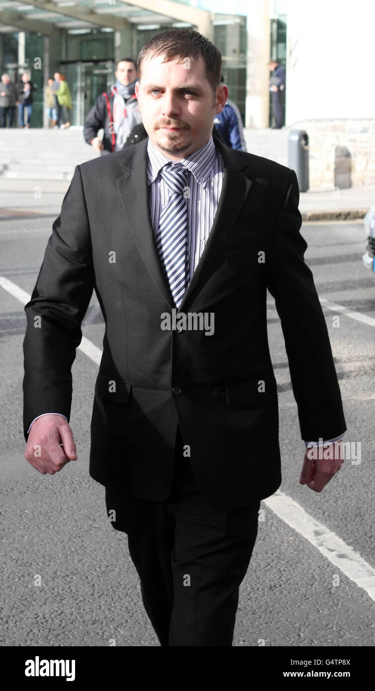 X Factor judge Louis Walsh in high spirits as he walks past Brown
