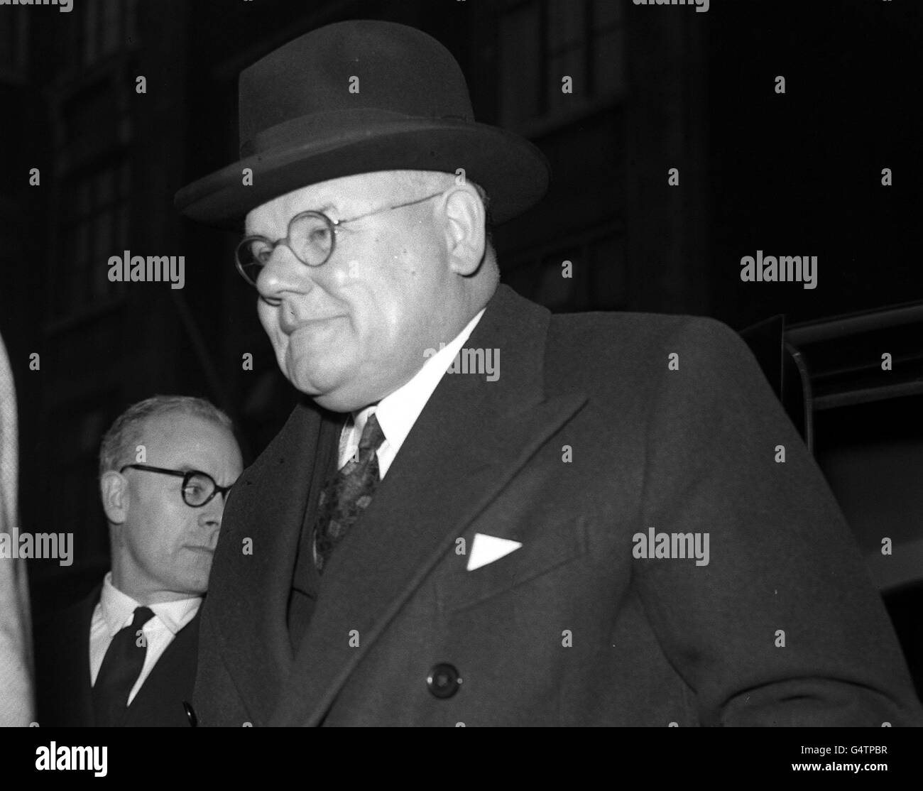 Dr John Bodkin Adams of Eastbourne arrives at the London chamber of the General Medical Council to appear before the disciplinary committee. He is to answer the accusation that he was fined at Lewes Assizes for offences bringing him within scope of the Medical Act. Stock Photo