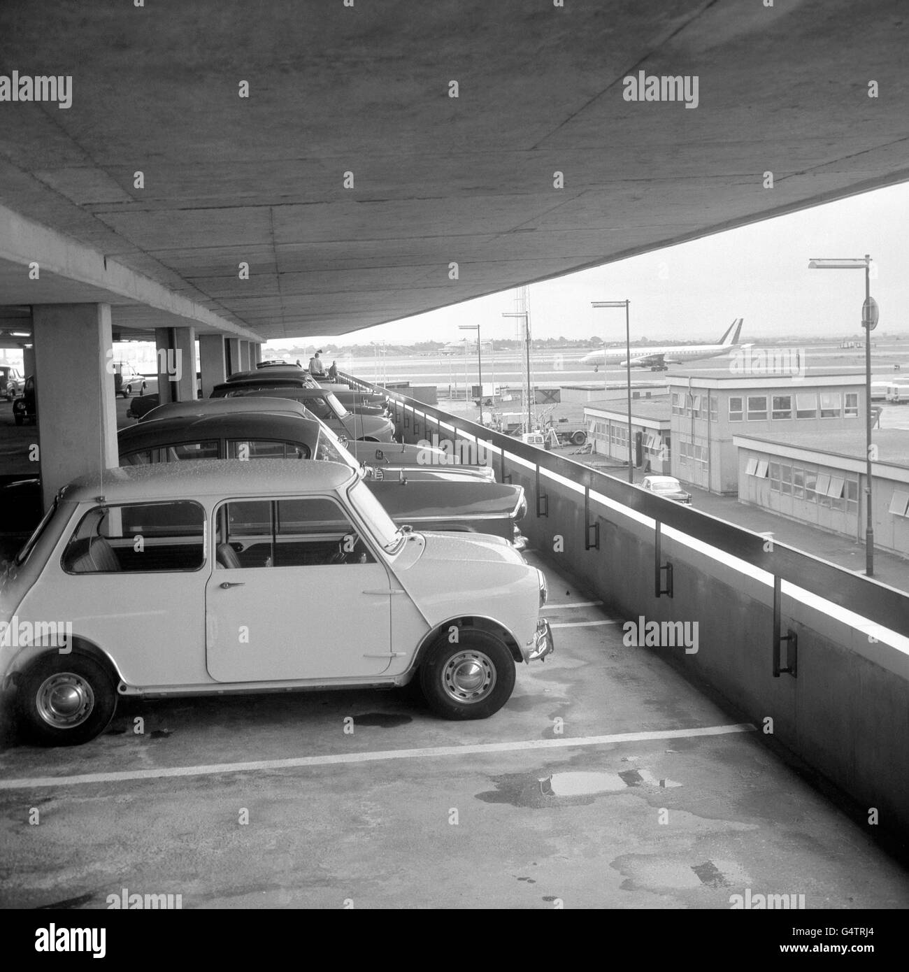 Vehicles parked in the new five-storey car park at London Airport. Said to be the largest car park in Britain, it will enable air passengers to leave their cars near the main outgoing and incoming European and long-distance airline buildings Stock Photo