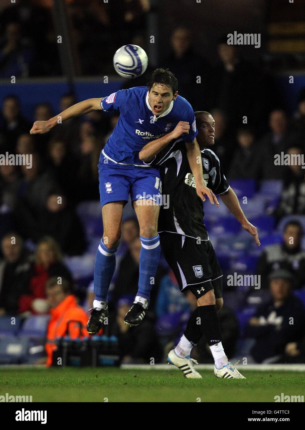 Soccer - npower Football League Championship - Birmingham City v Ipswich Town - St Andrews'. Ipswich Town's Andy Drury and Birmingham City's Nikola Zigic (left) battle for the ball Stock Photo