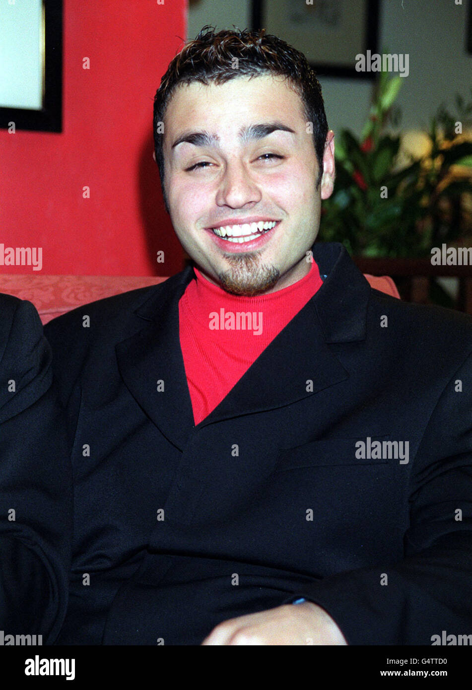 A member of the boy band Touch at The Daniels Bar, Cafe Royal in London for the press launch of The Millennium Ball, which claims to be the biggest New Year's Eve party in London, in aid of The Rhys Daniels Trust. Stock Photo