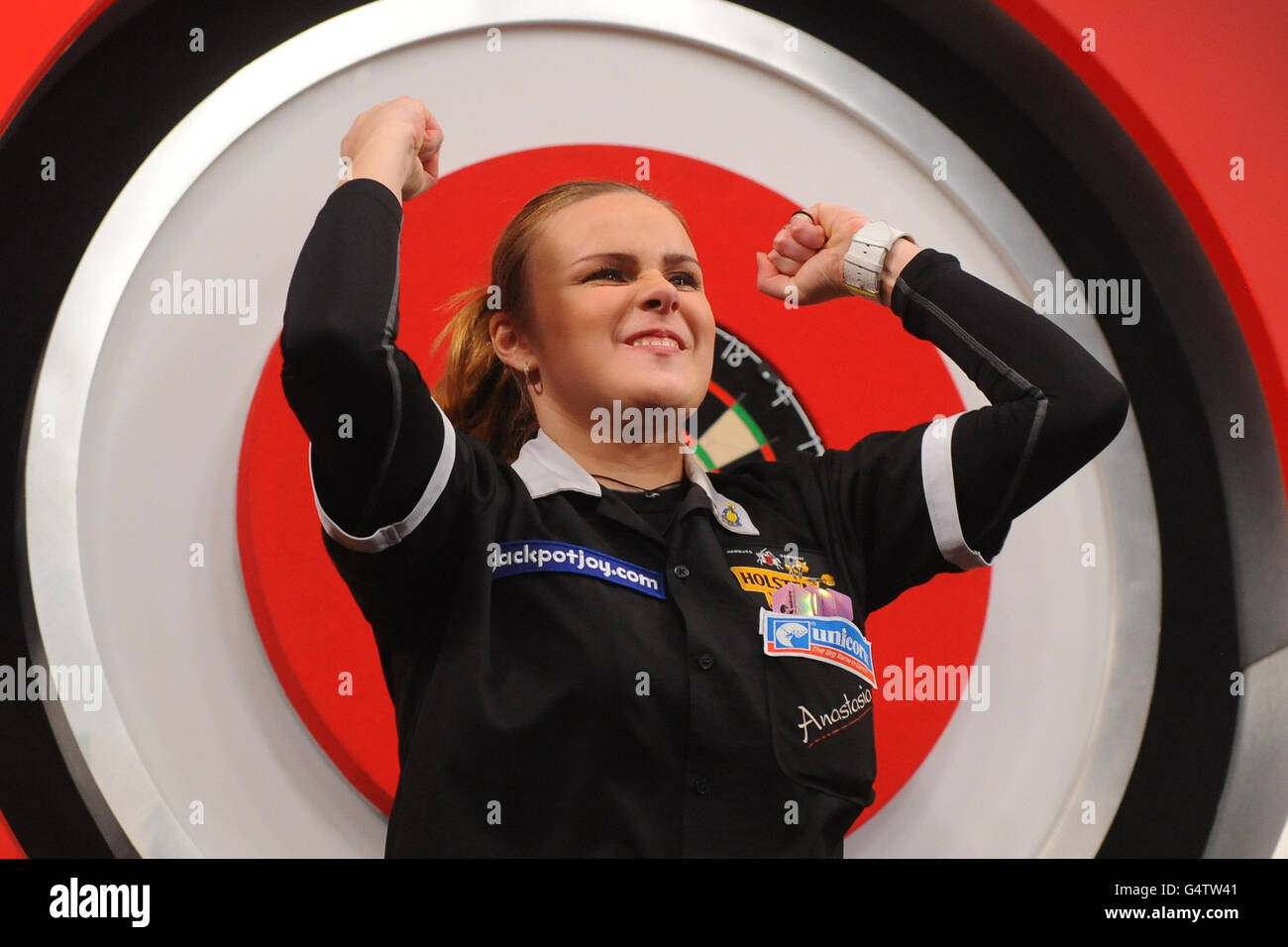 Russia's Anastasia Dobromyslova celebrates beating England's Deta Hedman to win the Women's BDO World Professional Darts Championships at the Lakeside Complex, Surrey. Stock Photo