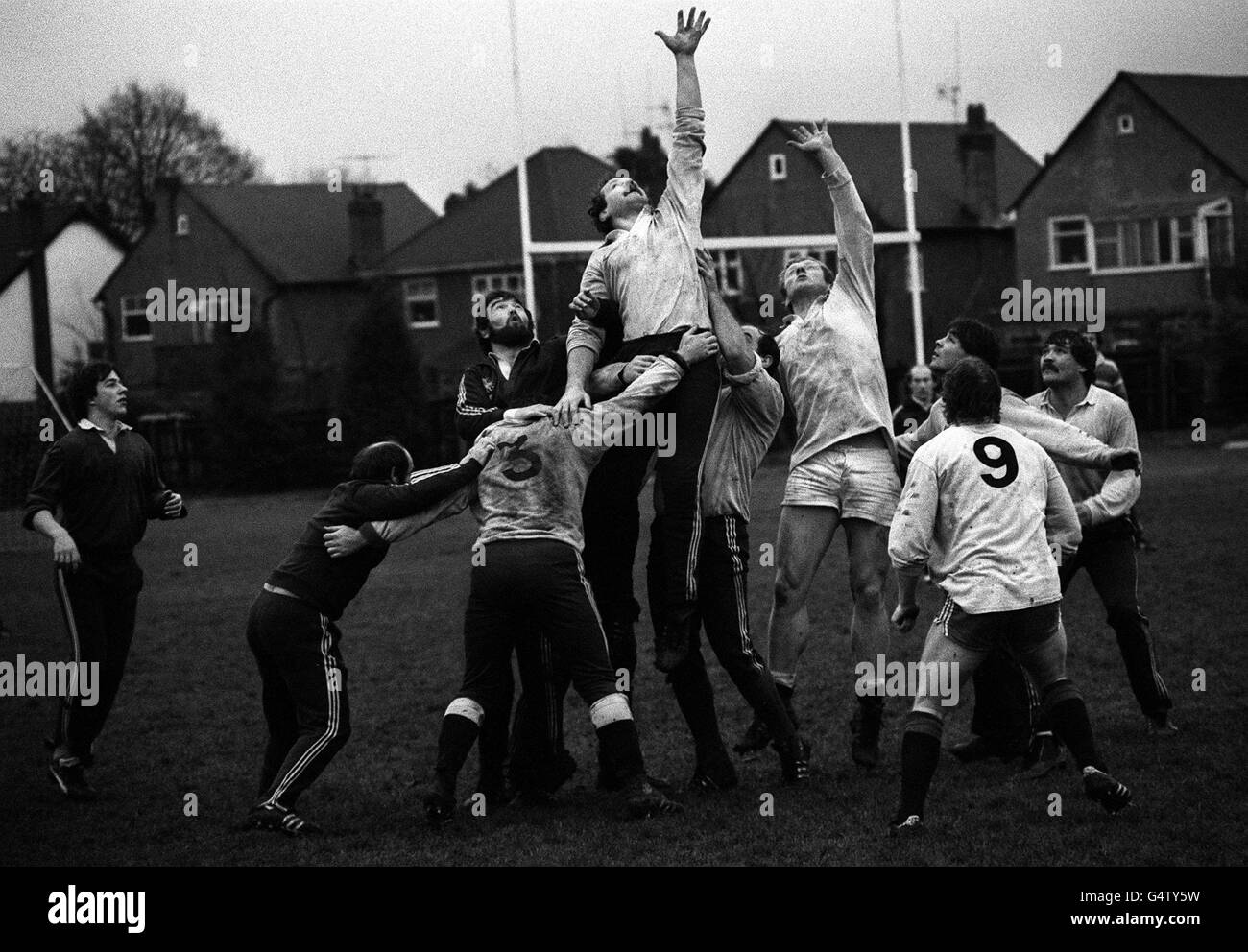 England rugby union captain Bill Beaumont (rising) who received the Insignia of OBE in the New Year Honours List, during line-out practice at St. Mary's College, Strawberry Hill, Twickenham, London, for a match against Australia. Stock Photo
