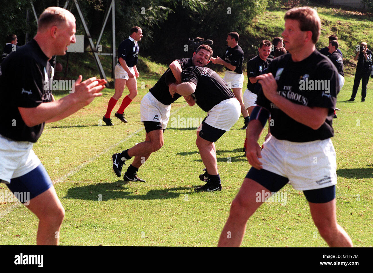 Scotland Rugby captain, Gavin Hastings (left) gets in his tackle training with Peter Wright, during the squads practice session in Pretoria for the first World Cup Match against the Ivory Coast. Stock Photo