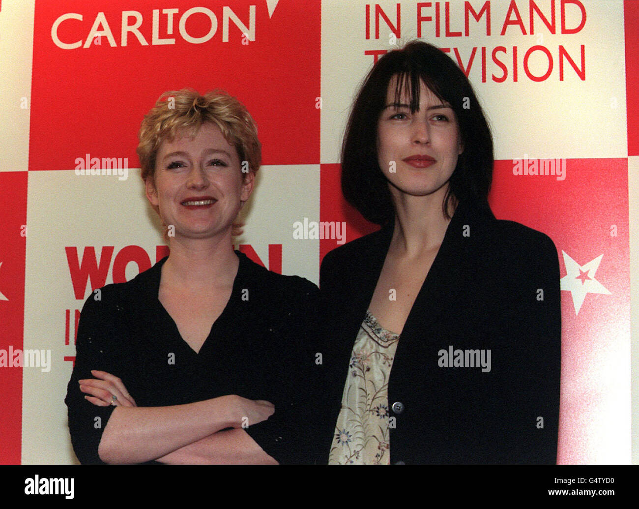 Actresses Zara Turner (L) and Gina McKee at the 9th Carlton Women in Film  and Television Awards luncheon, in London, where they presented awards. The  award ceremony pays tribute to the film