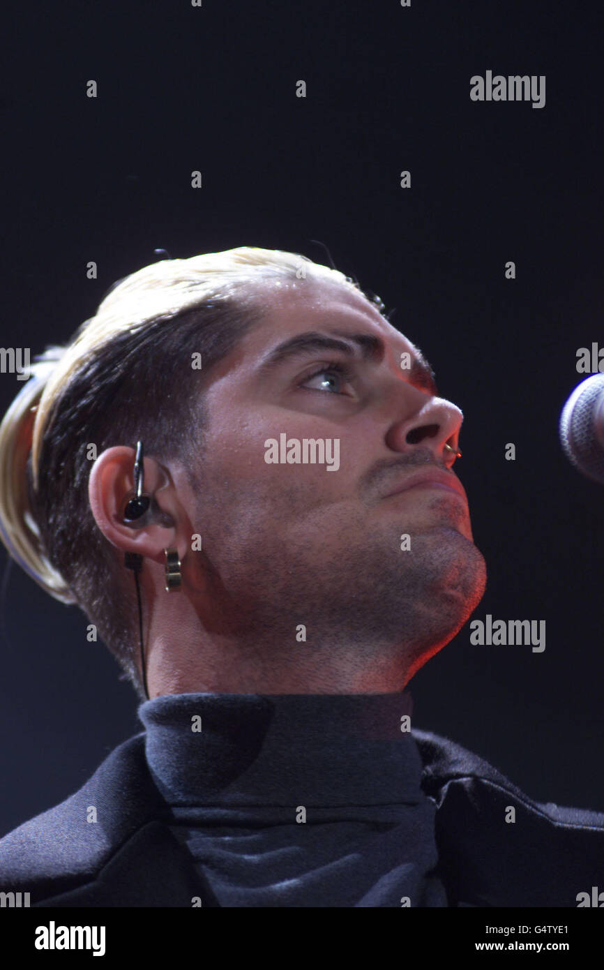 Shane Lynch of the band Boyzone performs on stage at Wembley Arena