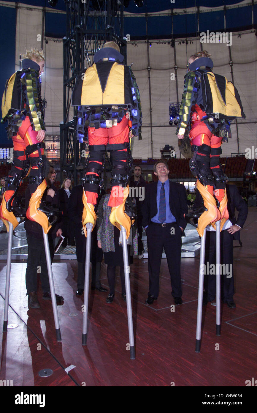 Prime Minister Tony Blair meets stilt walking bungee jumpers while