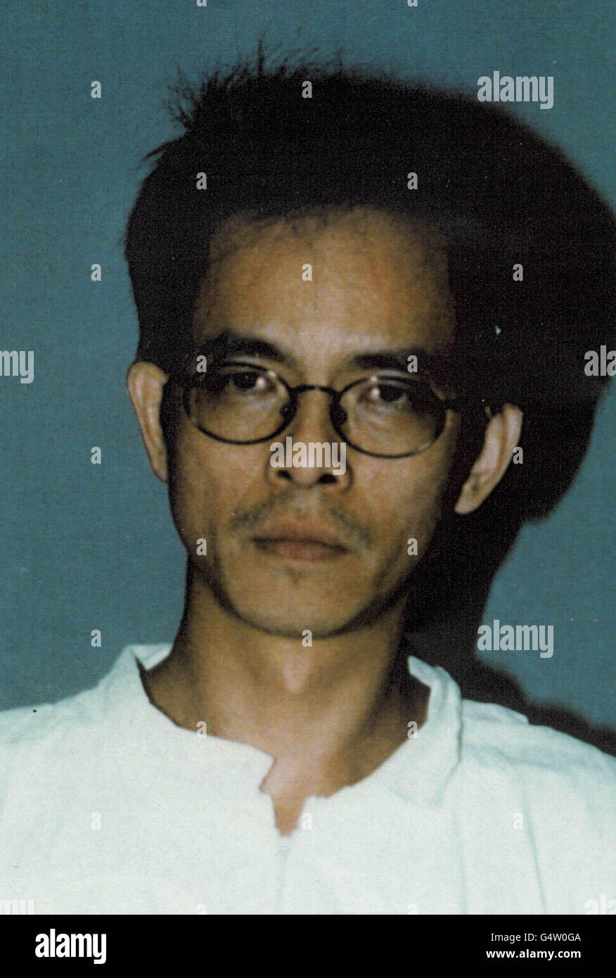 Police issued photo of Leung Fook Seng, jailed for11 years at Kingston Crown Court, resulting from a police action that smashed a lucrative people smuggling and extortion racket by a ruthless gang known as Snakeheads who kidnapped illegal immigrants. * They then demanded ransoms of tens of thousands of pounds from poor relatives in China. The Metropolitan Police claimed a major victory against the gangs at the end of a series of trials which have led to the conviction of 19 Chinese men and women. Stock Photo
