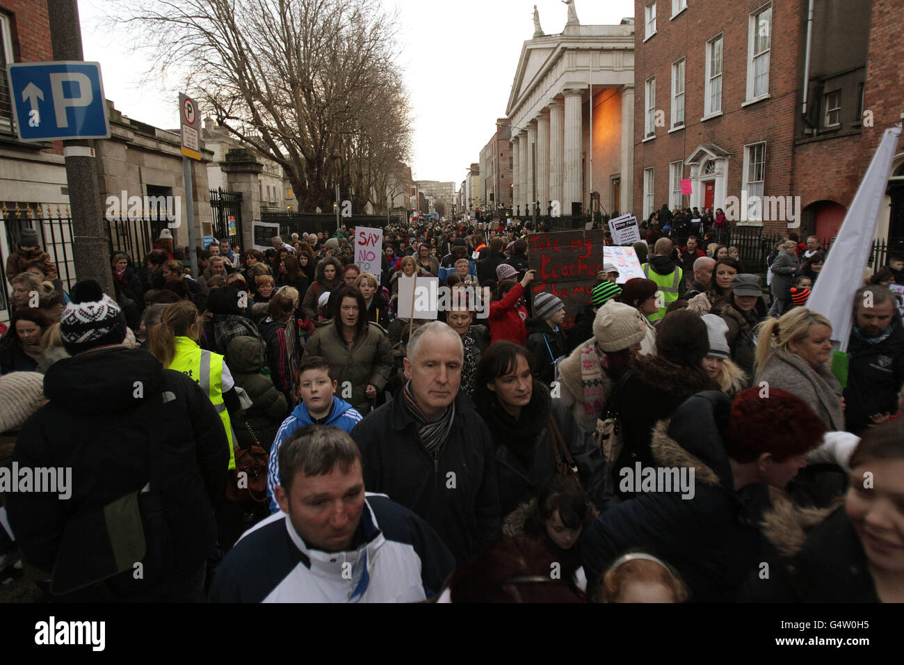 Some of the thousands of teachers and school children from Dublin's disadvantaged schools (DEIS - Delivering Equality of Opportunity in Schools), protest outside the Department of Education in Marlborough Street, Dublin. Stock Photo