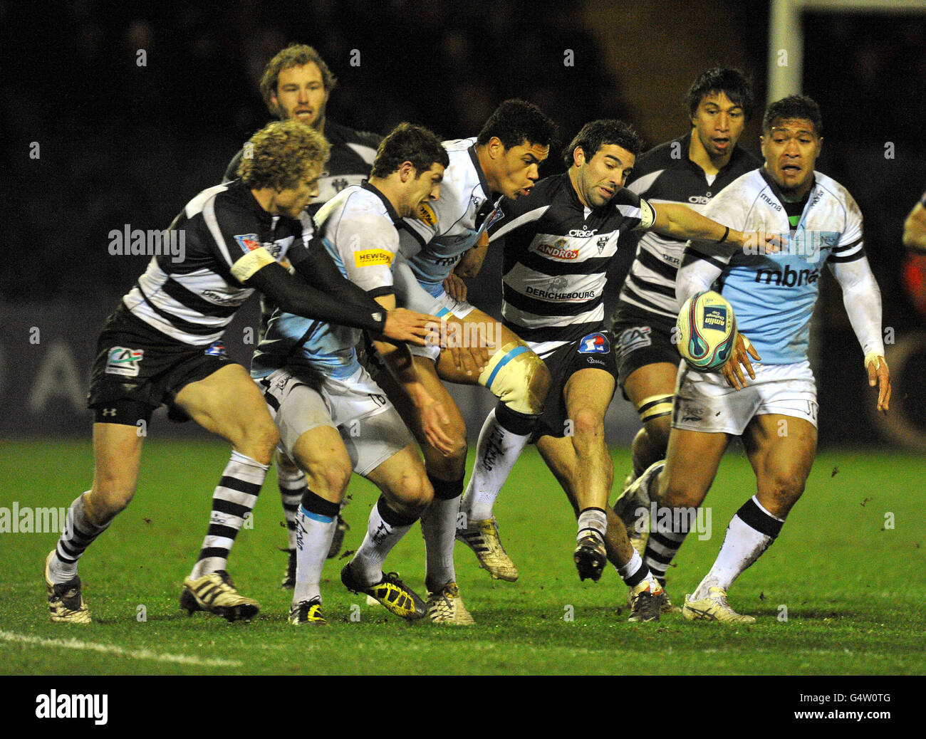 (Left-Right) Brive's Guillaume Namy, Sale Sharks' Tom Brady and Luther Burrell, Brive's Augustin Figeurola and Sale sharks' Johnny Leota chase a loose ball Stock Photo
