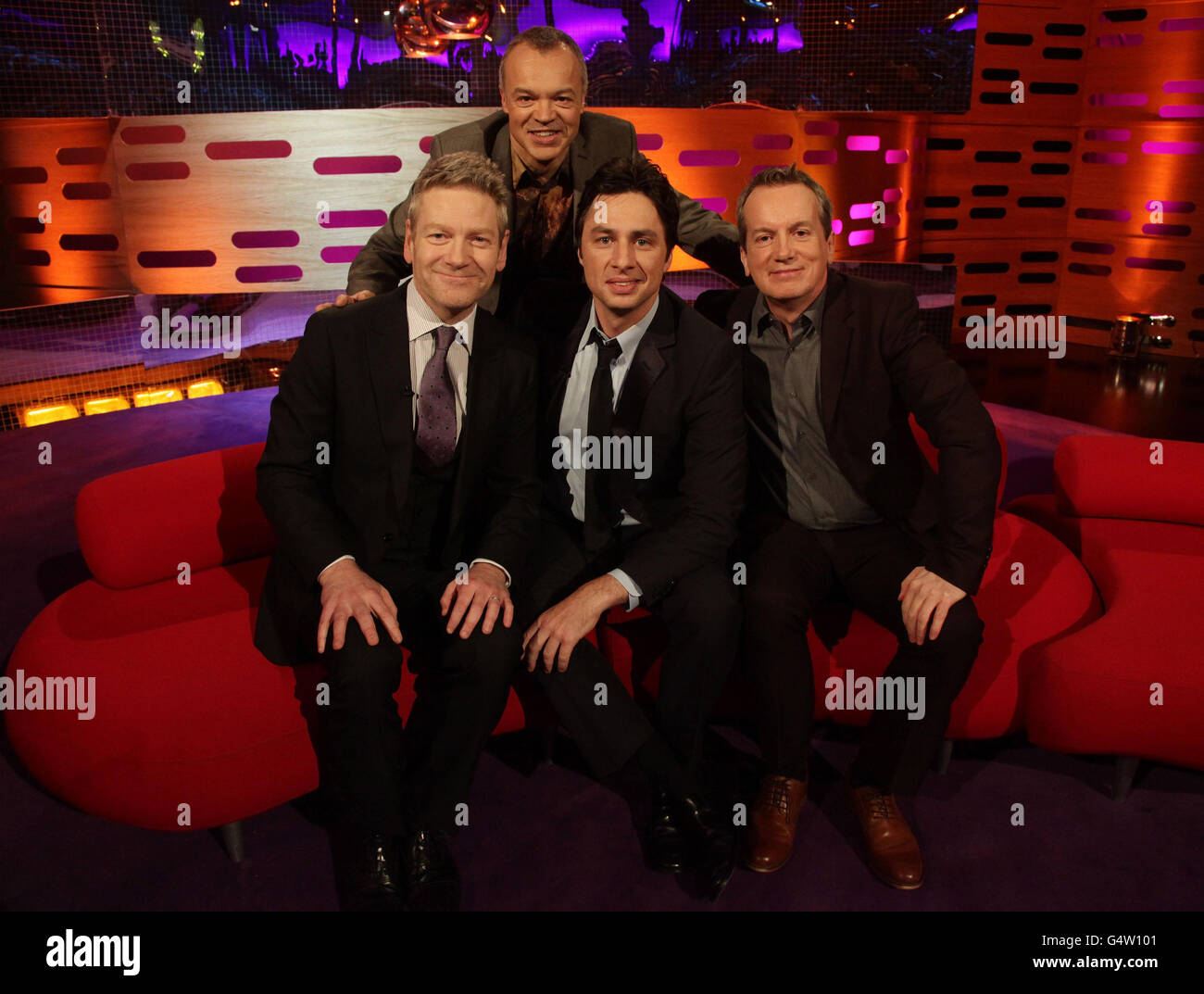 Host Graham Norton (top) with guests (left to right) Kenneth Branagh, Zach Braff and Frank Skinner during filming of The Graham Norton Show at The London Studios in south London. Stock Photo