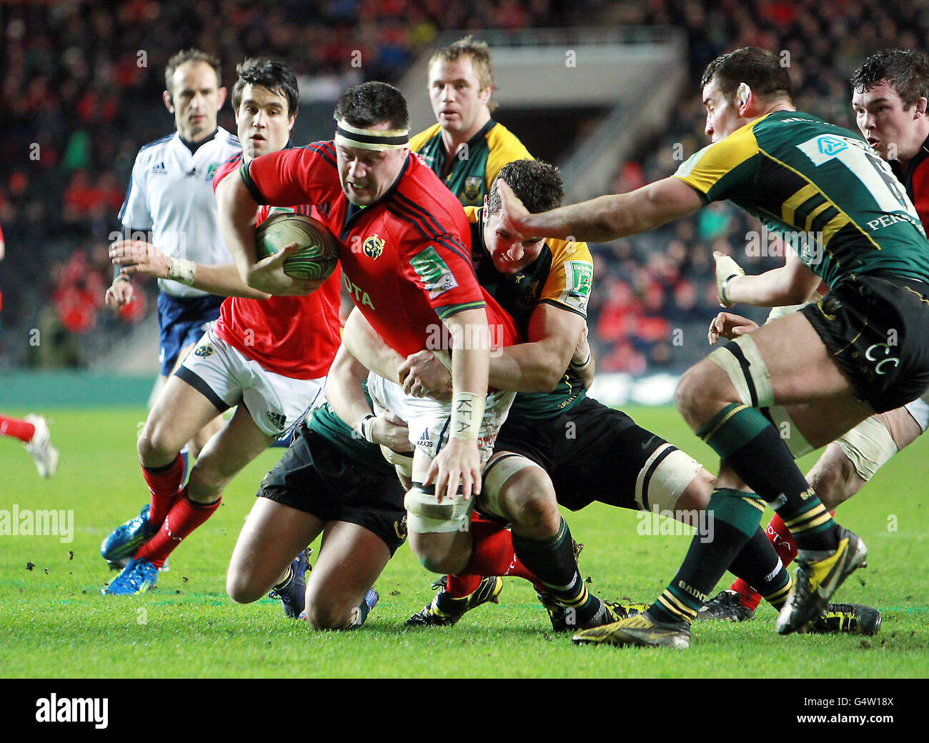 Rugby Union - Heineken Cup - Pool 1 - Northampton Saints v Munster Rugby - stadium:mk. Munster's James Coughlan is tackled by Northampton Saints' Phil Dowson during the Heineken Cup Pool One match at Stadium MK, Milton Keynes. Stock Photo