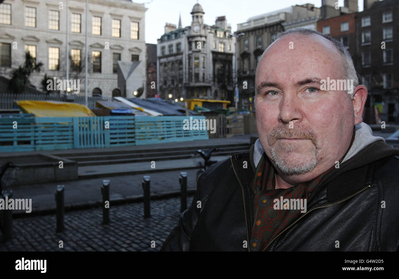 Frank McQuade, who owns three clothes shops on Fownes Street in Dublin's Temple Bar, pictured near to the Occupy Dame Street camp which is is calling to be dismantled. Stock Photo