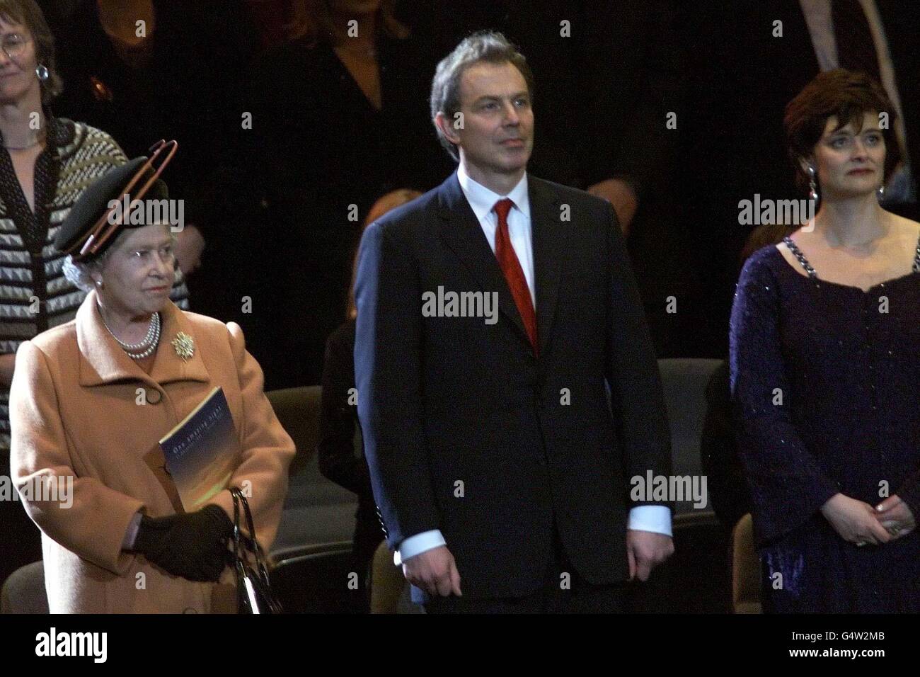 Britain's Queen Elizabeth II stands alongside Prime Minister Tony Blair