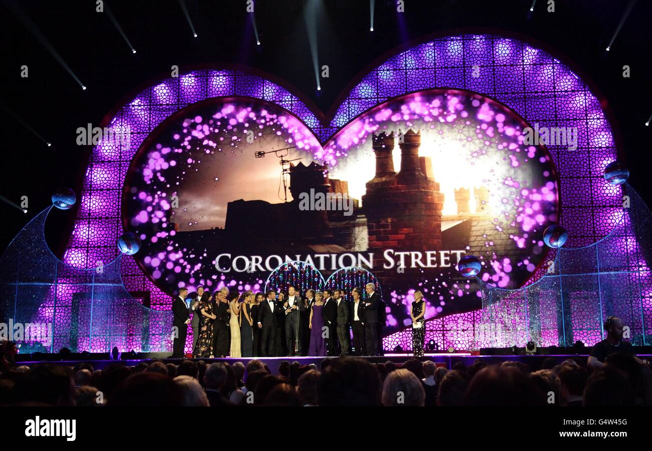 Cast and crew of Coronation Street collect the Serial Drama award on stage during the 2012 NTA Awards at the O2, Greenwich, London Stock Photo